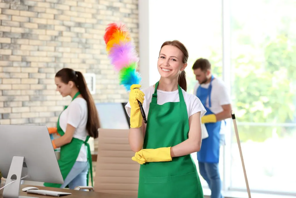 A team of professional janitorial technicians working in an office providing expert commercial cleaning services.