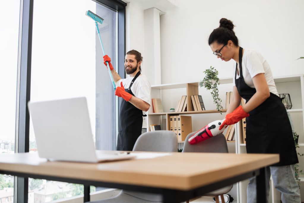 A cleaning crew providing professional commercial cleaning services in an office.